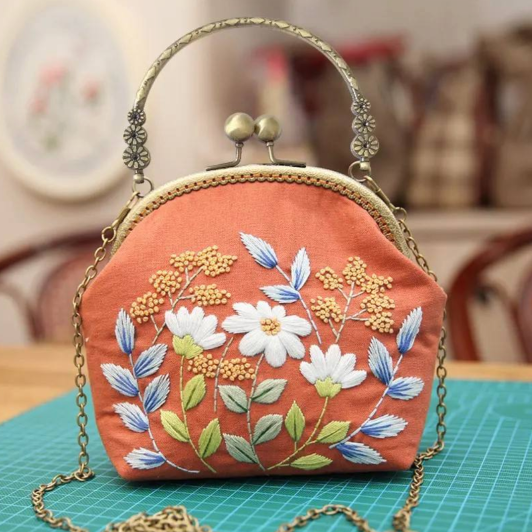 Embroidered clutch bag hotsell